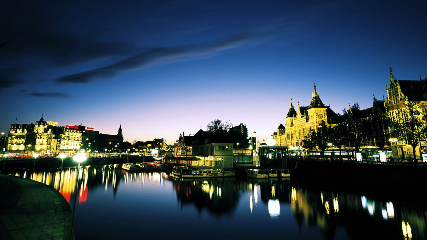 Body of Water Near Buildings During Night Time. Wallpaper in 1366x768 Resolution
