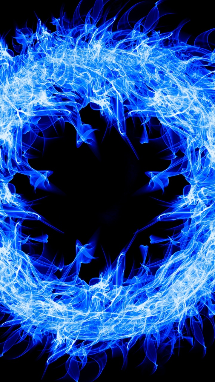 Gelbes Feuer Auf Schwarzem Hintergrund. Wallpaper in 720x1280 Resolution