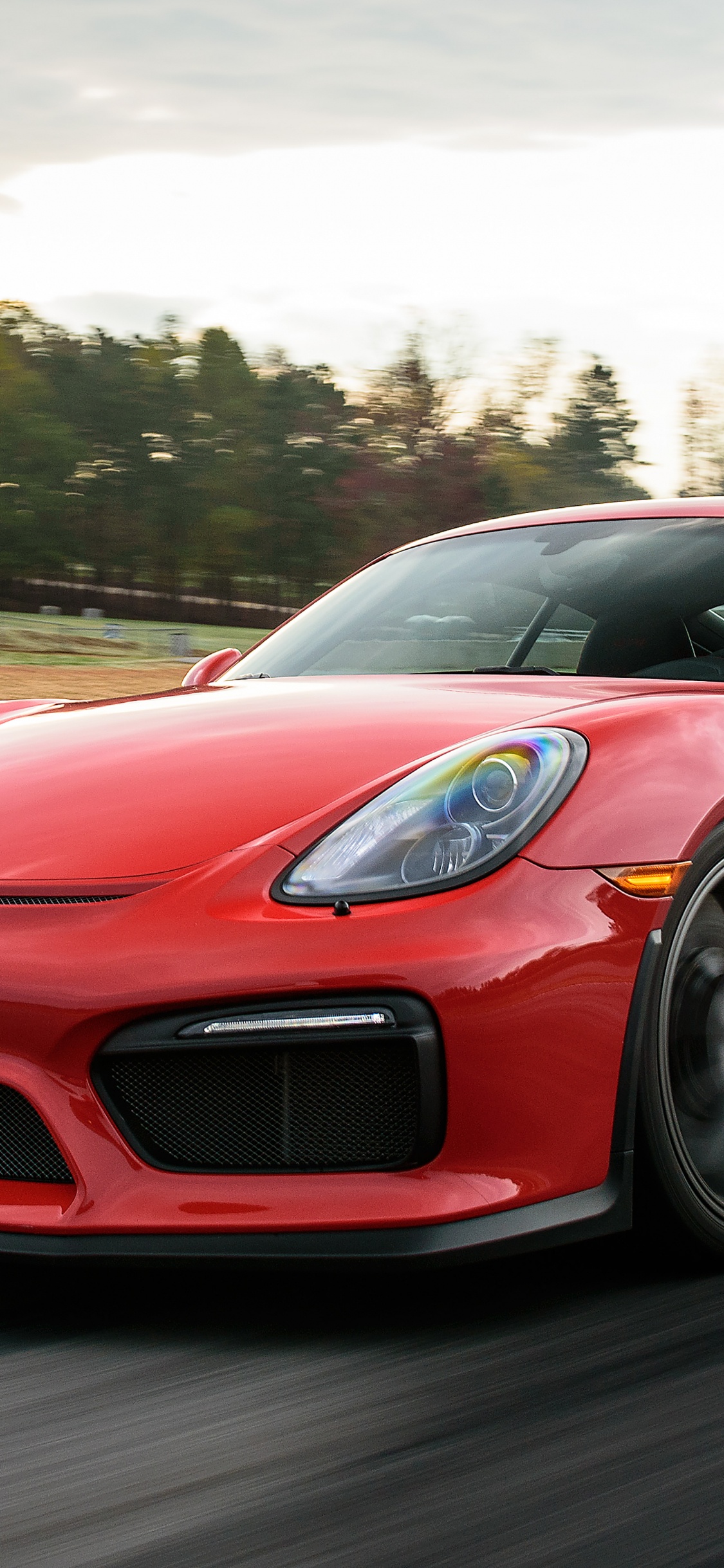 Ferrari Rouge 458 Italia Sur Route Pendant la Journée. Wallpaper in 1125x2436 Resolution