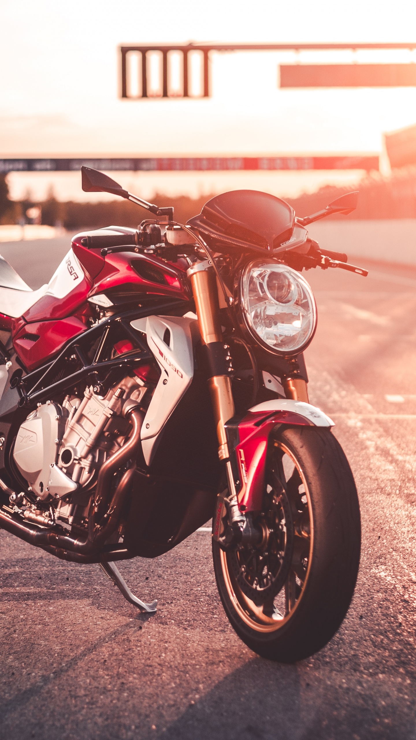 Red and Black Sports Bike on Road During Daytime. Wallpaper in 1440x2560 Resolution
