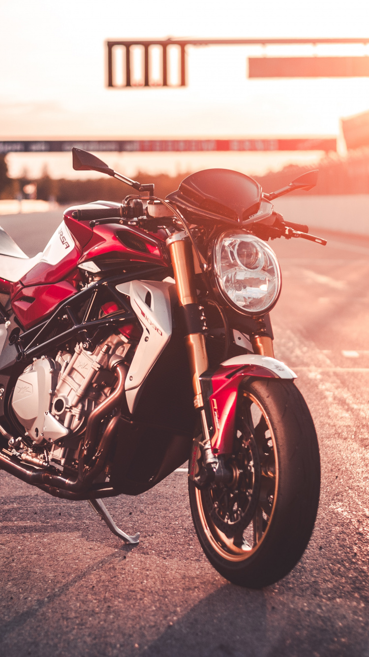 Red and Black Sports Bike on Road During Daytime. Wallpaper in 750x1334 Resolution