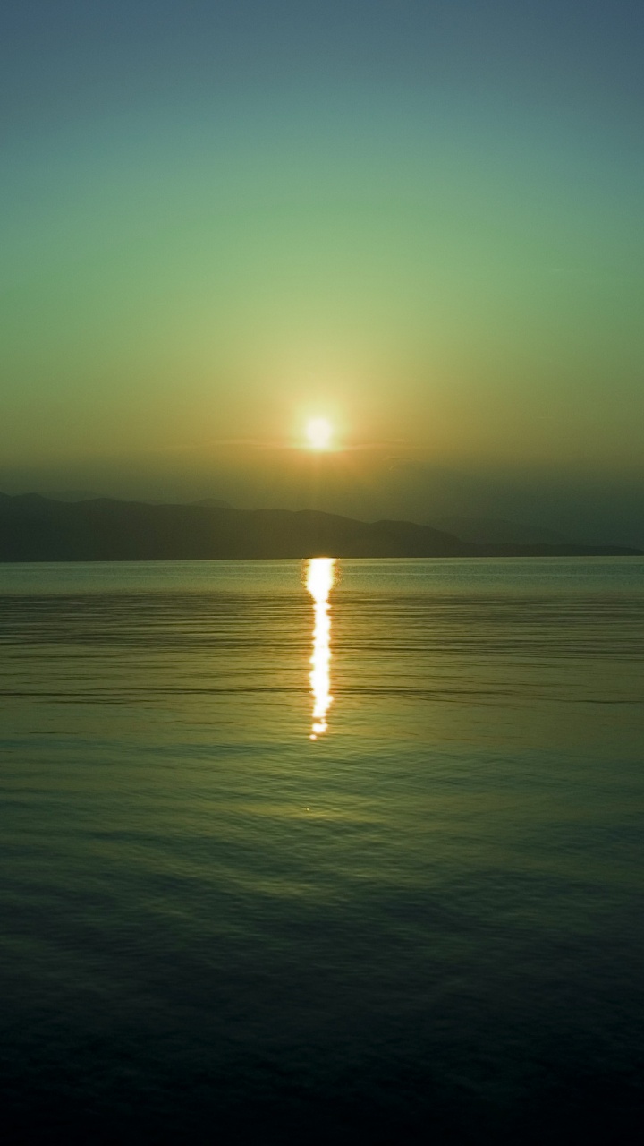 Cuerpo de Agua Durante la Puesta de Sol. Wallpaper in 720x1280 Resolution