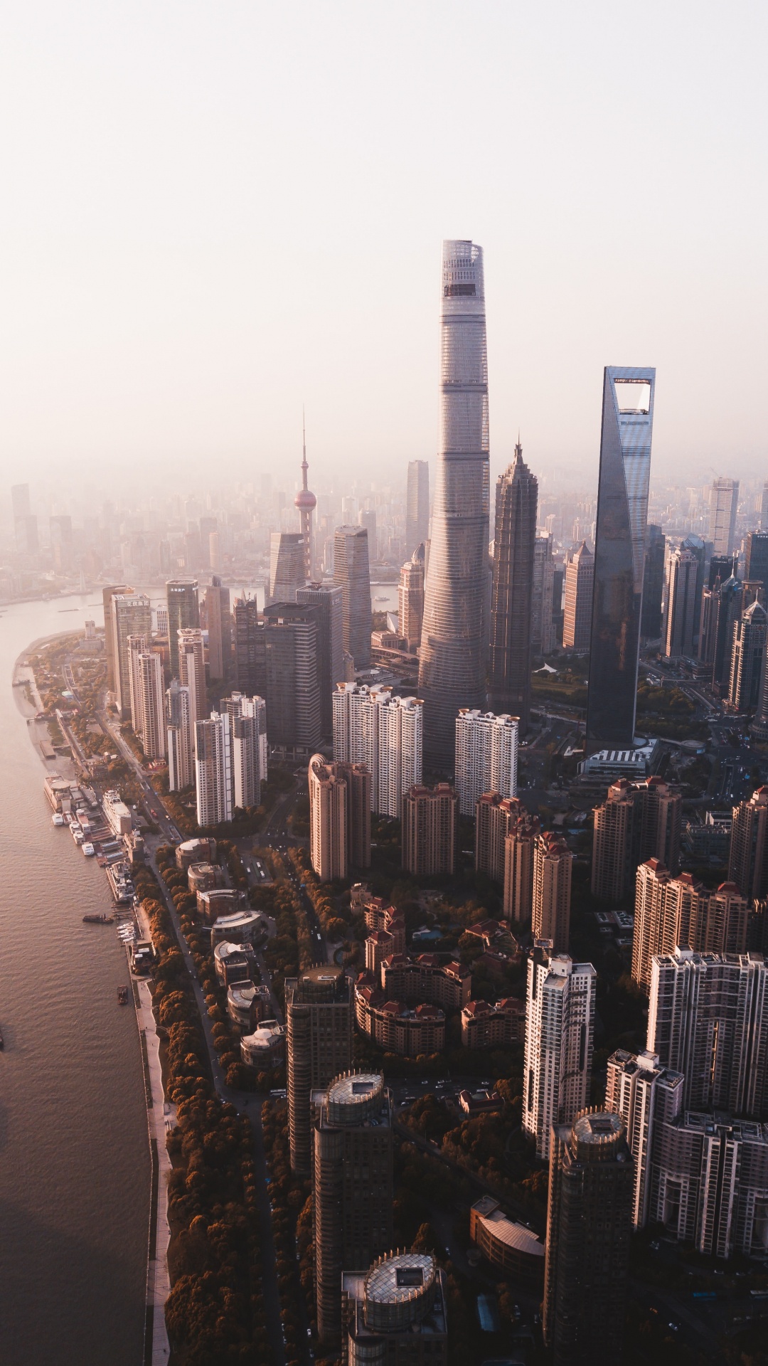 High Rise Buildings Near Body of Water During Daytime. Wallpaper in 1080x1920 Resolution