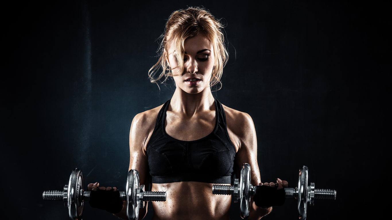 Woman in Black Tank Top Holding Dumbbell. Wallpaper in 1366x768 Resolution