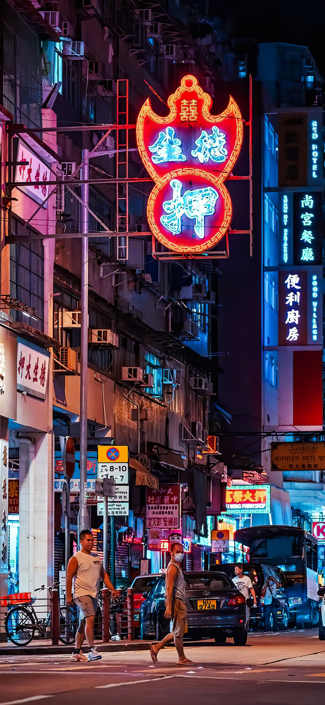 Landmark, Neon Sign, Building, Tire, Blue. Wallpaper in 1125x2436 Resolution