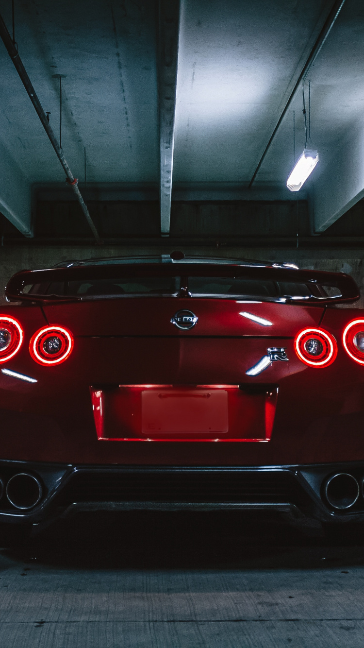 Red Car in a Tunnel. Wallpaper in 750x1334 Resolution