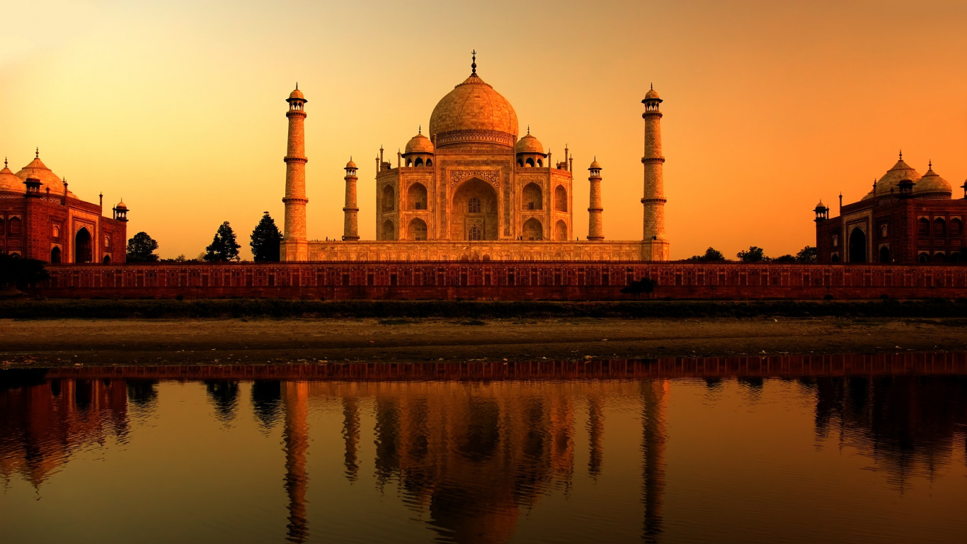 Brown and White Dome Building Near Body of Water During Daytime. Wallpaper in 1366x768 Resolution