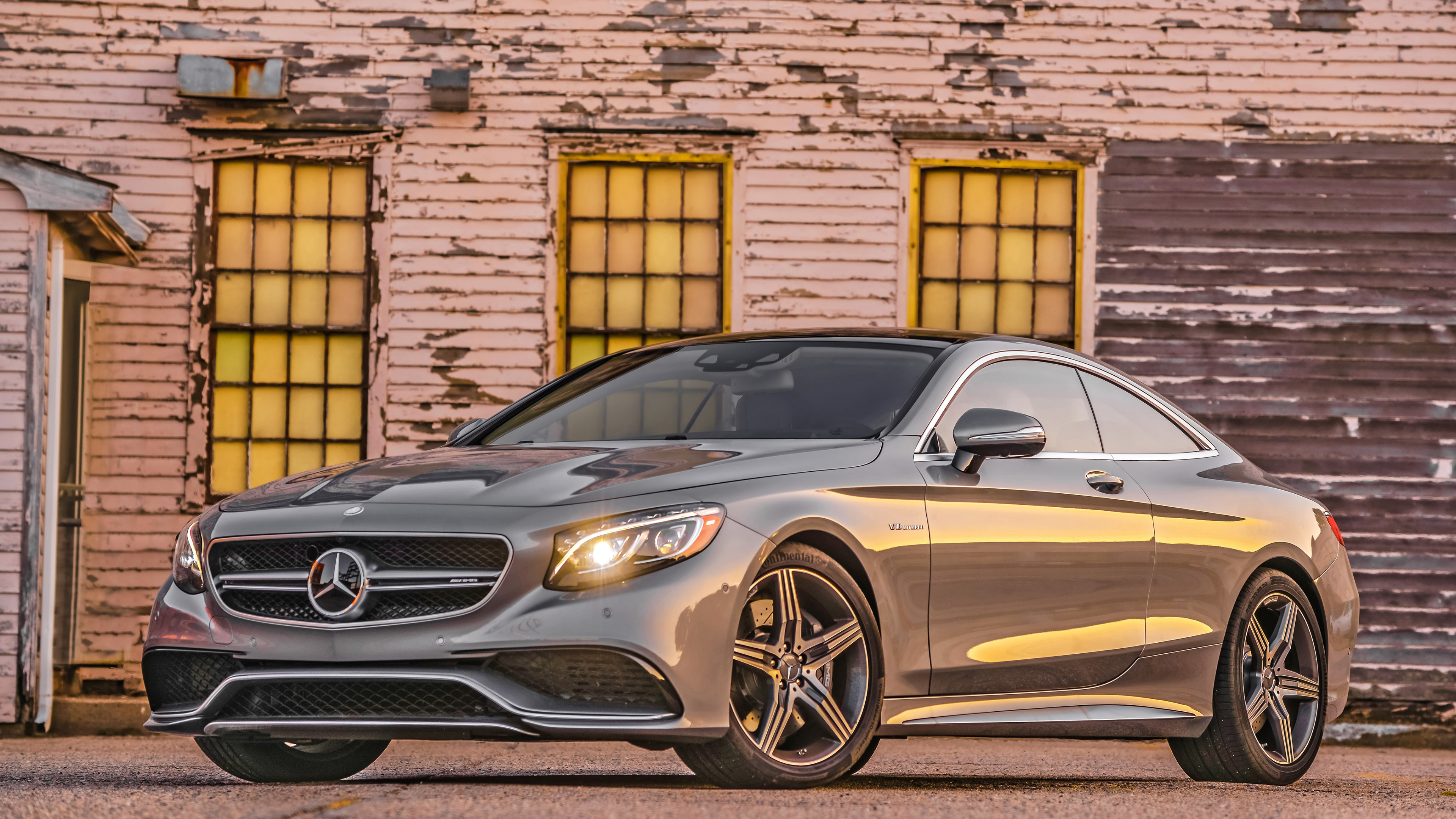 Silver Mercedes Benz Coupe Parked Beside Brown Brick Wall. Wallpaper in 3840x2160 Resolution