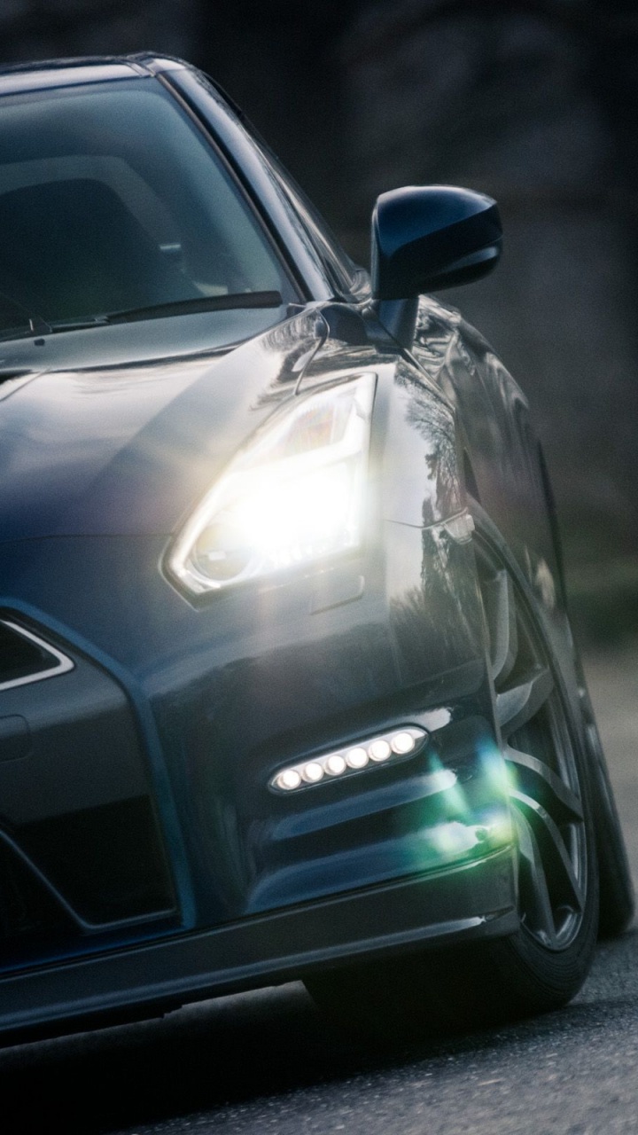 Schwarzer Porsche 911 Tagsüber Unterwegs. Wallpaper in 720x1280 Resolution