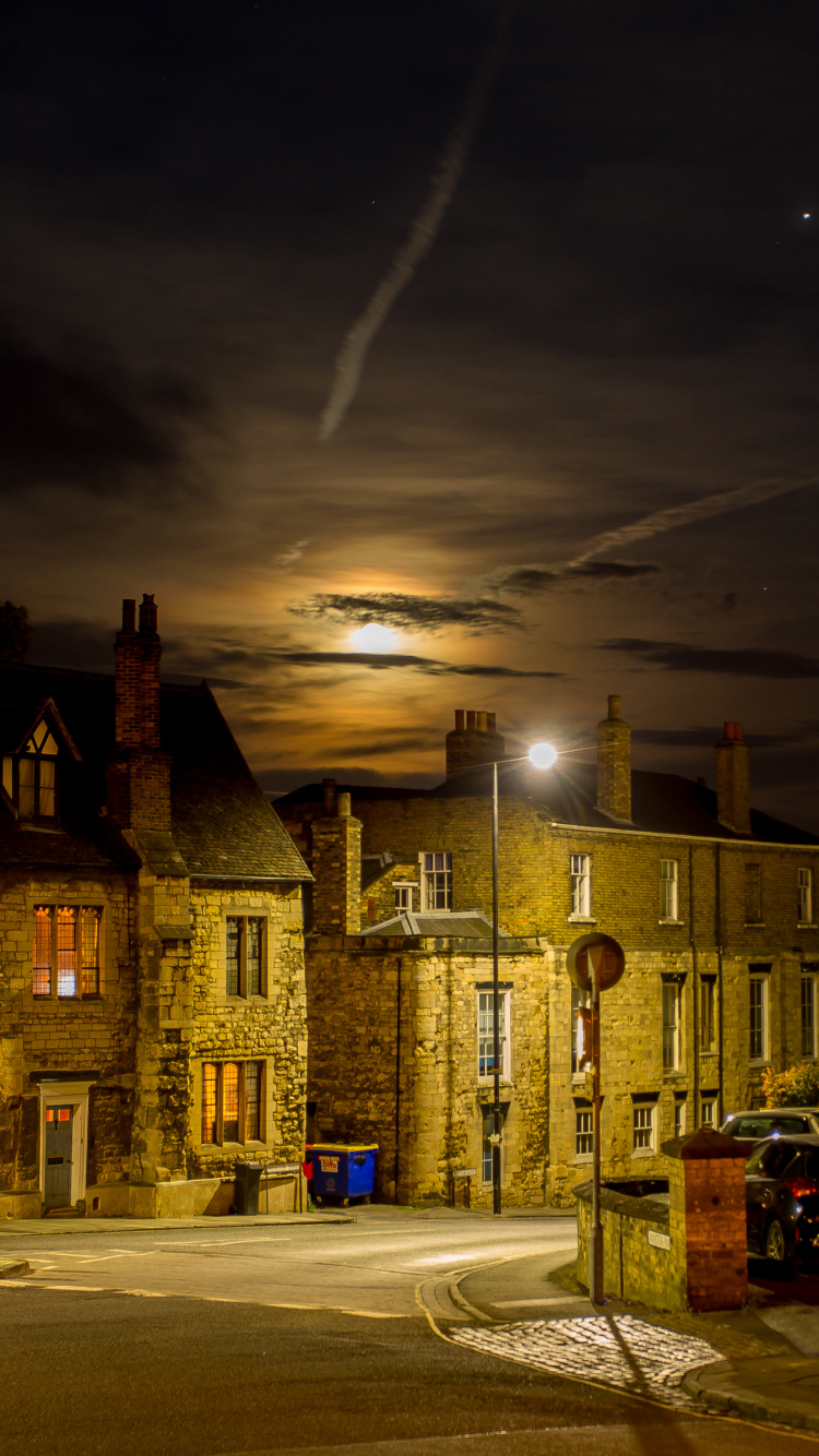 Bâtiment en Béton Brun Pendant la Nuit. Wallpaper in 750x1334 Resolution