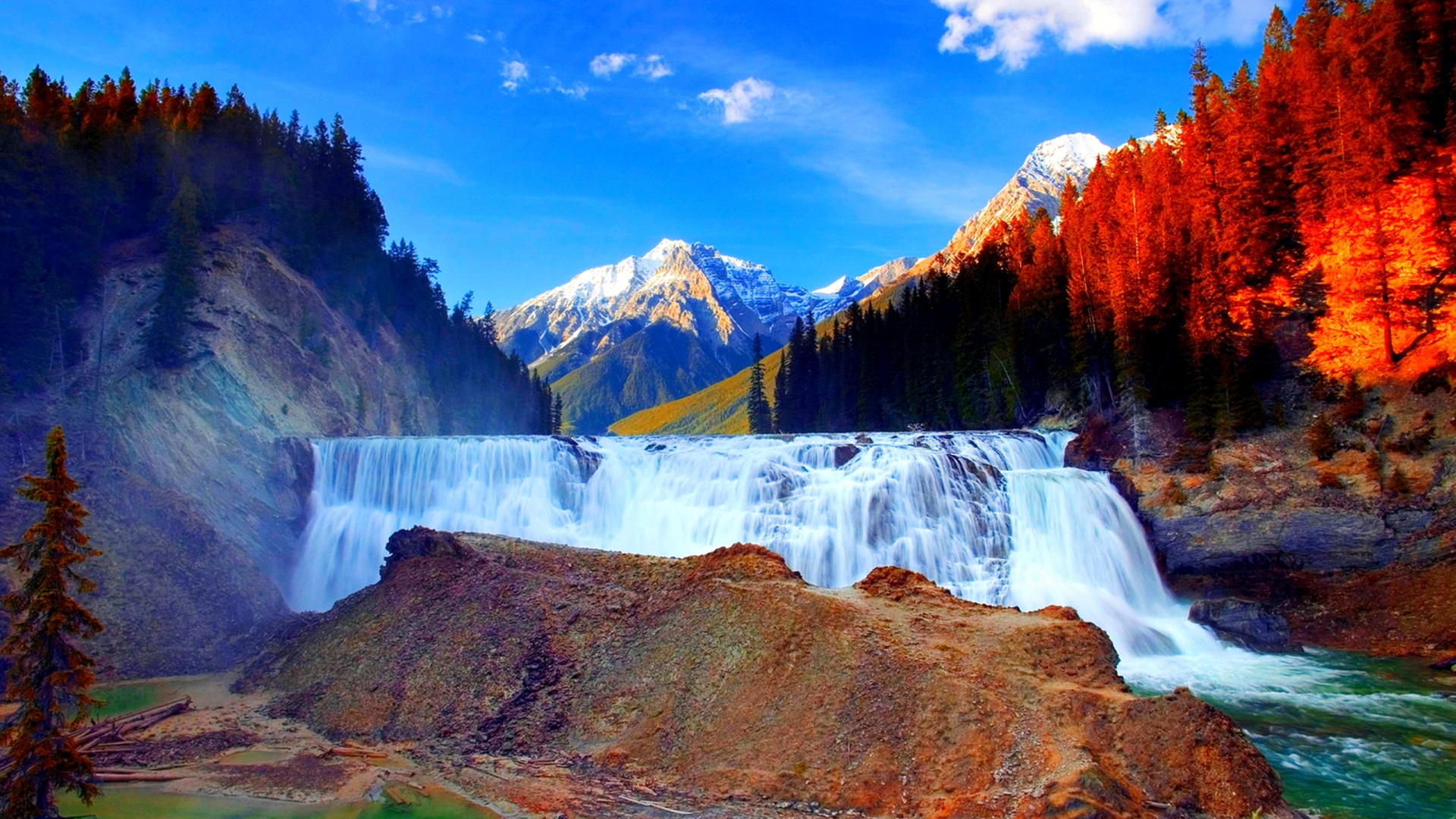 Waterfalls Near Brown and Green Mountain Under Blue Sky During Daytime. Wallpaper in 1920x1080 Resolution
