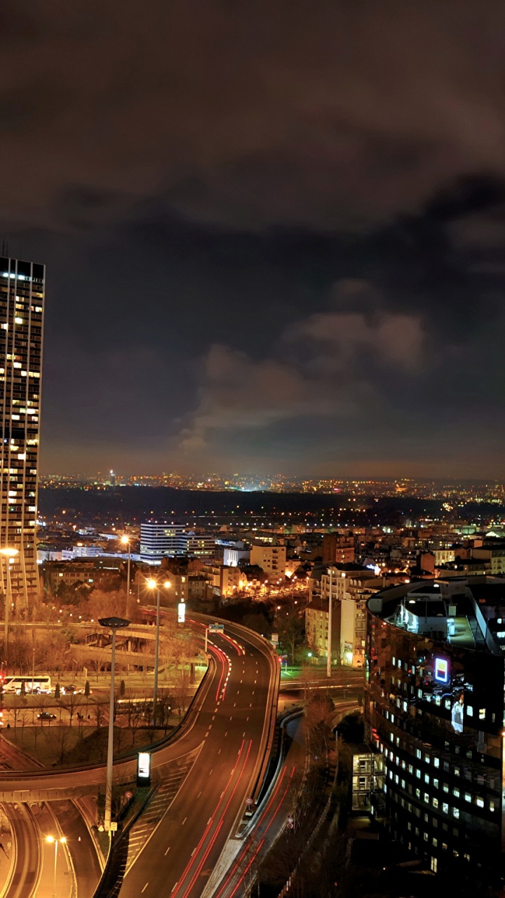 City Buildings During Night Time. Wallpaper in 720x1280 Resolution