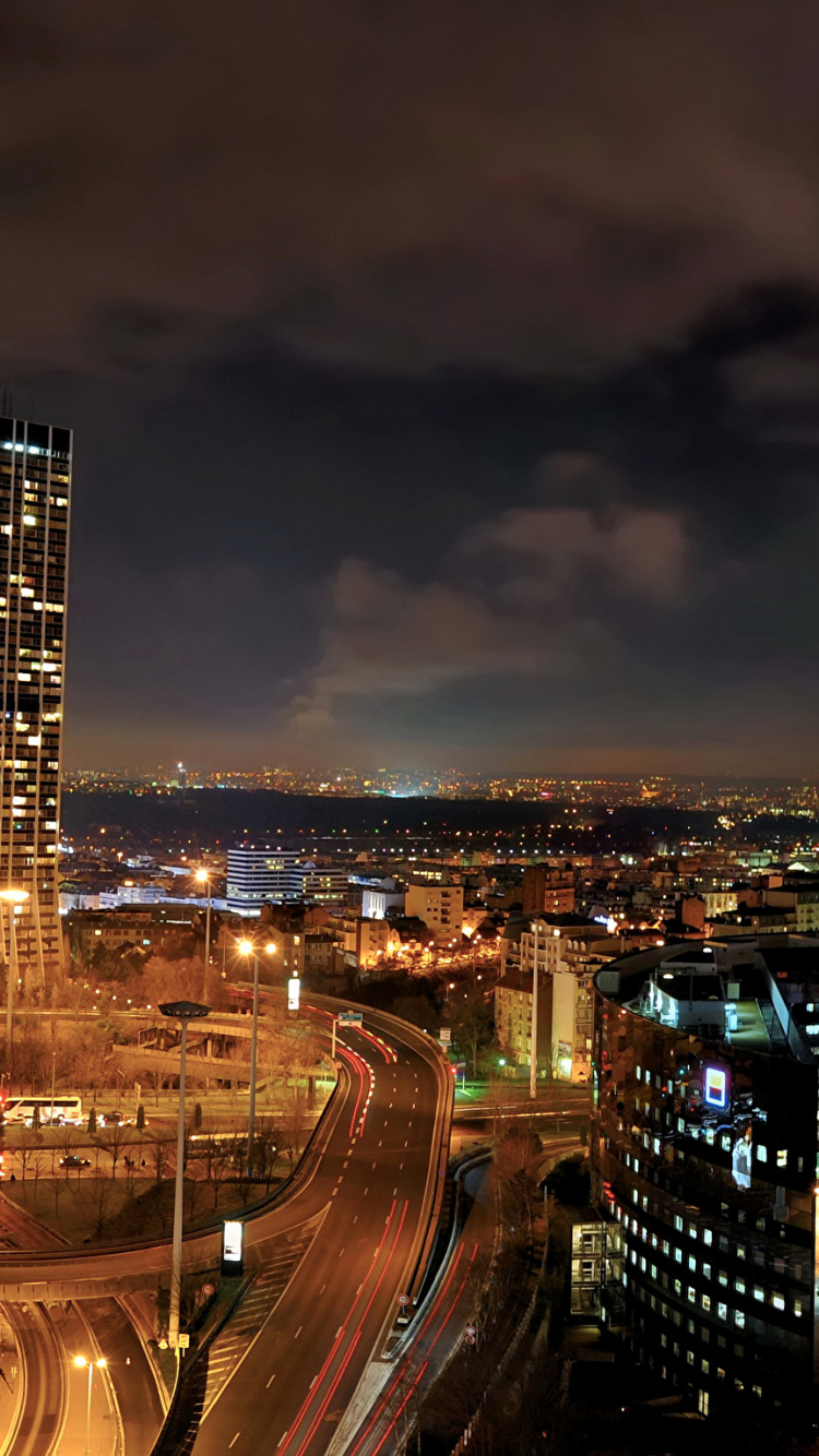 City Buildings During Night Time. Wallpaper in 750x1334 Resolution