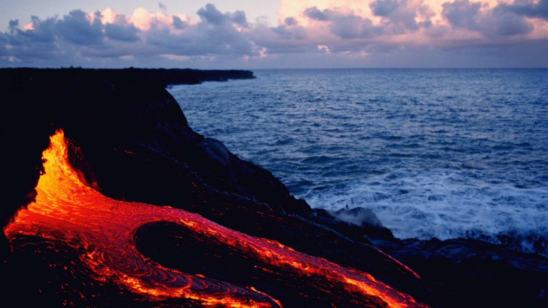Brown Rock Formation Near Body of Water During Daytime. Wallpaper in 1920x1080 Resolution