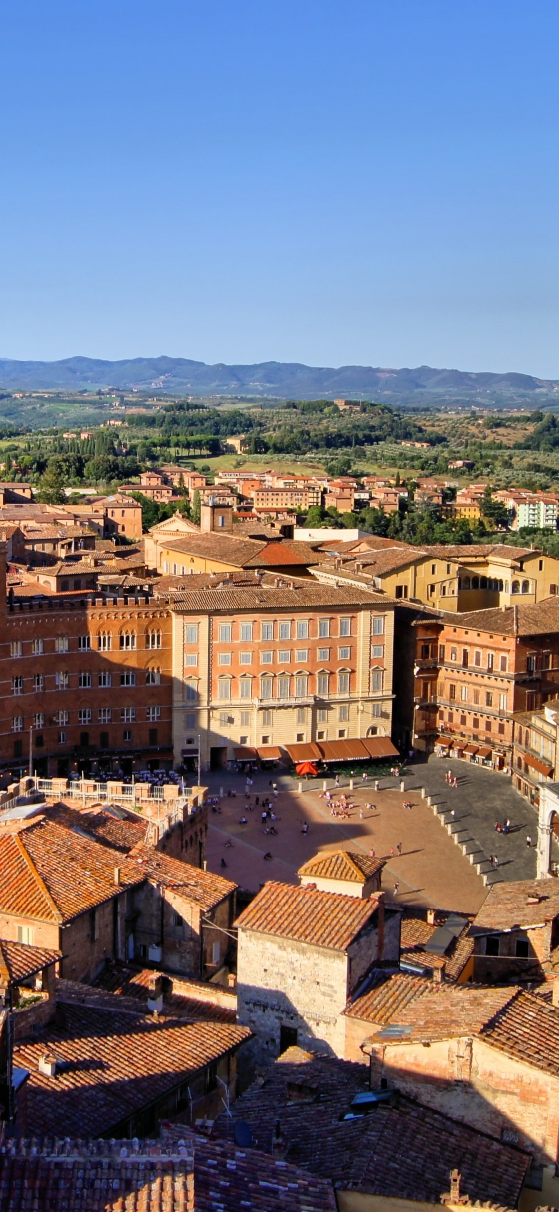 Vista Aérea de Los Edificios de la Ciudad Durante el Día.. Wallpaper in 1125x2436 Resolution
