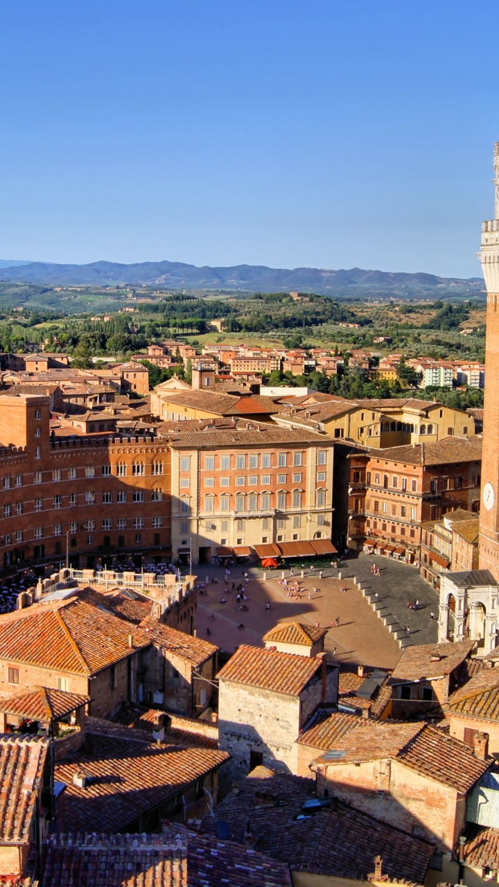 Vista Aérea de Los Edificios de la Ciudad Durante el Día.. Wallpaper in 720x1280 Resolution
