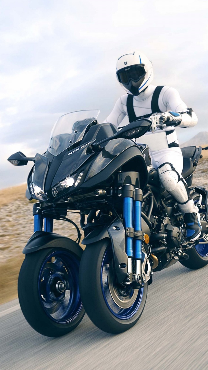 Man in Black and Gray Motorcycle Suit Riding on Black Motorcycle on Gray Asphalt Road During. Wallpaper in 720x1280 Resolution