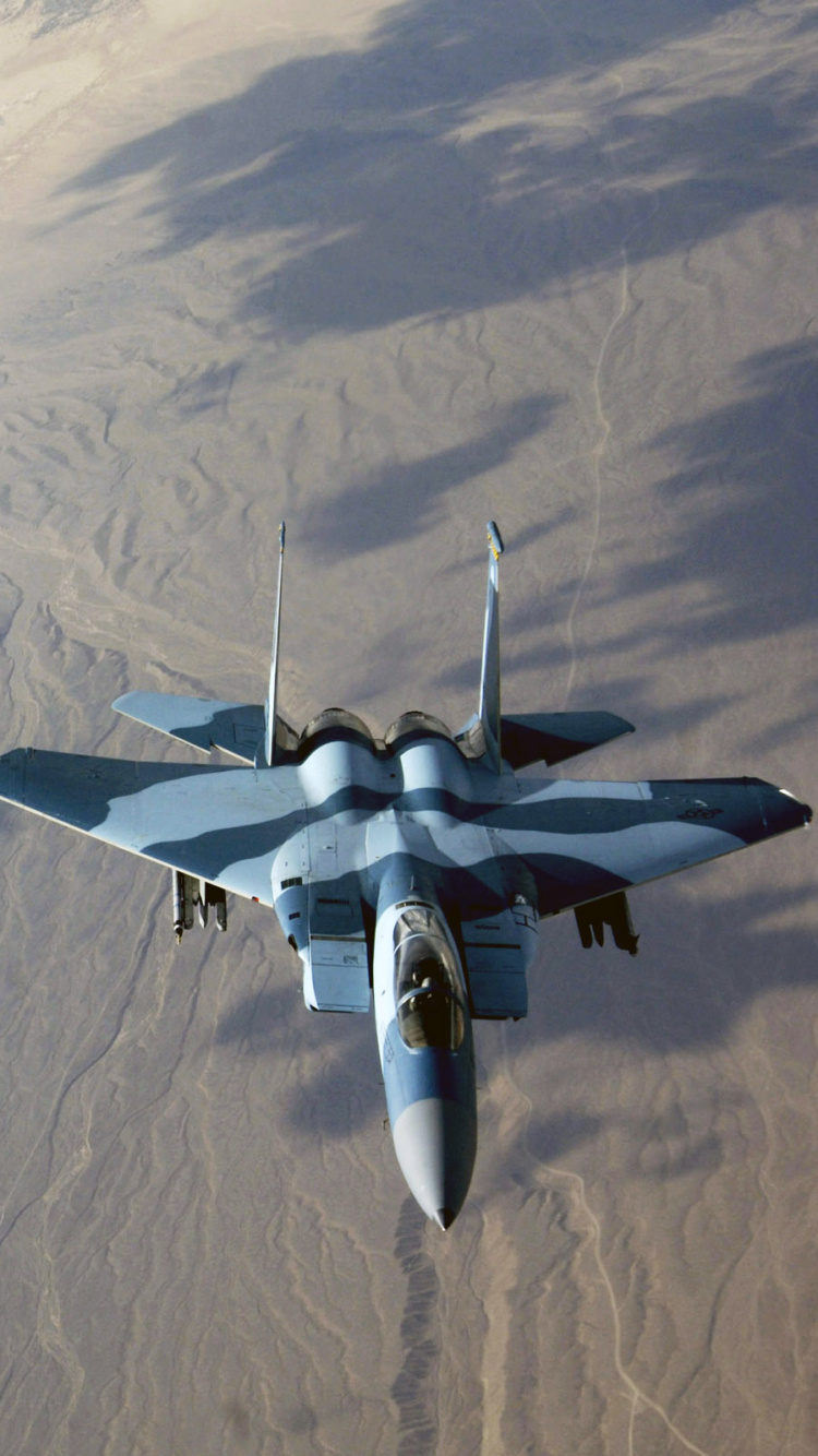 White Jet Plane on White Sand During Daytime. Wallpaper in 750x1334 Resolution