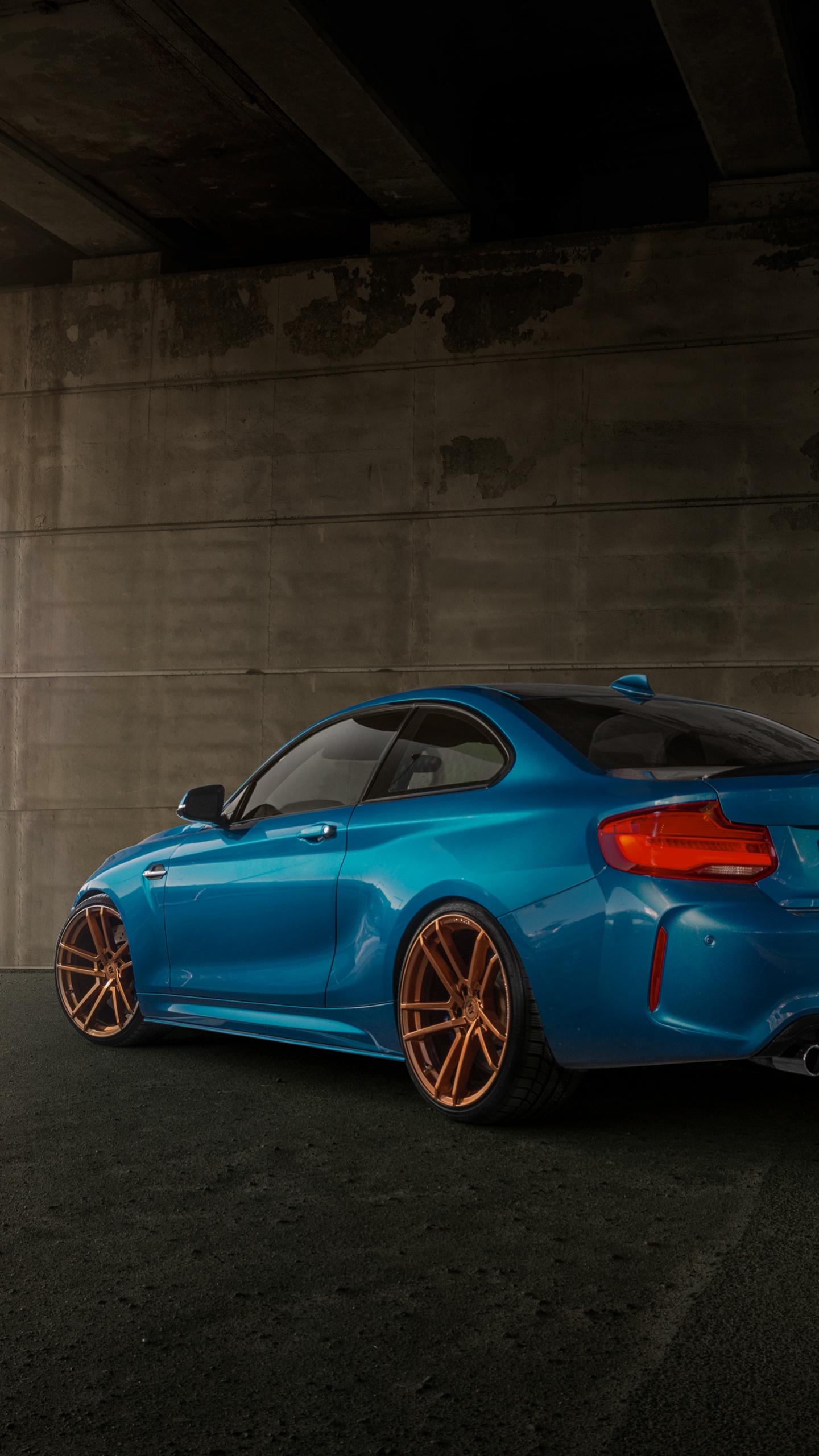 Blue Bmw m 3 Coupe Parked in Tunnel. Wallpaper in 1440x2560 Resolution