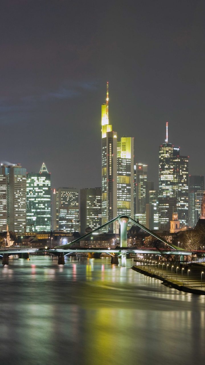 City Skyline During Night Time. Wallpaper in 720x1280 Resolution