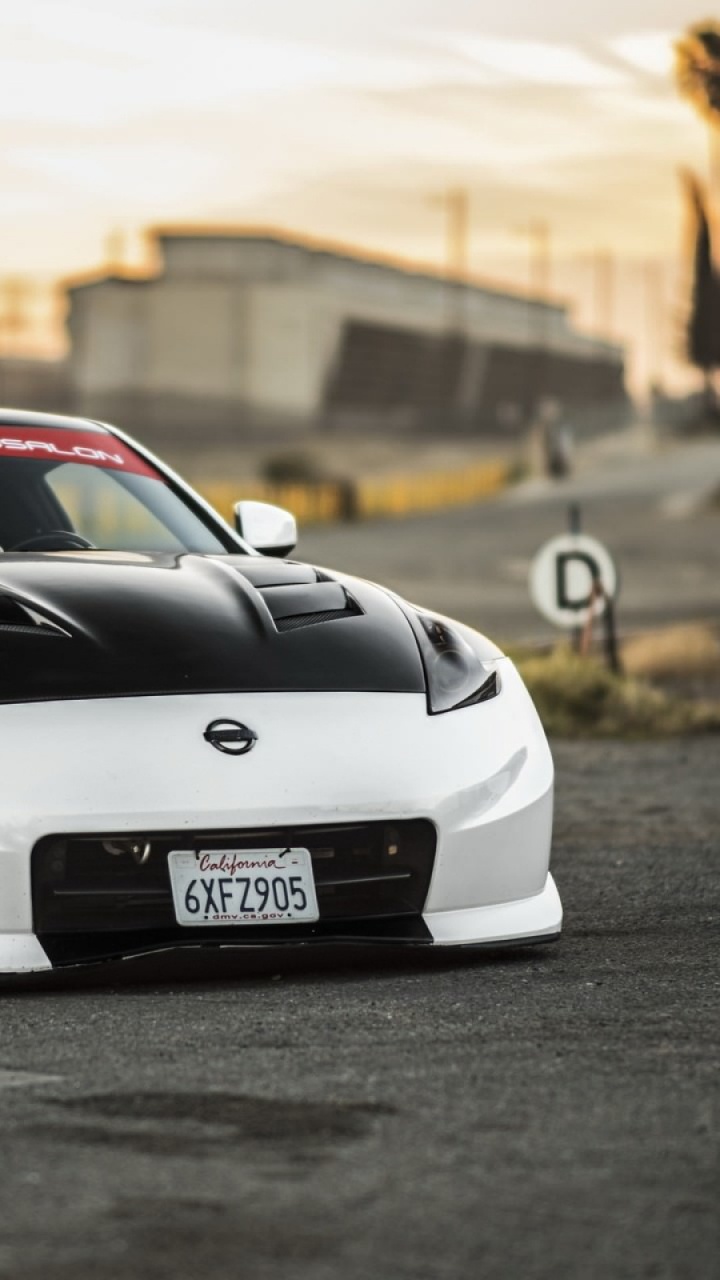 White Porsche 911 on Road During Daytime. Wallpaper in 720x1280 Resolution