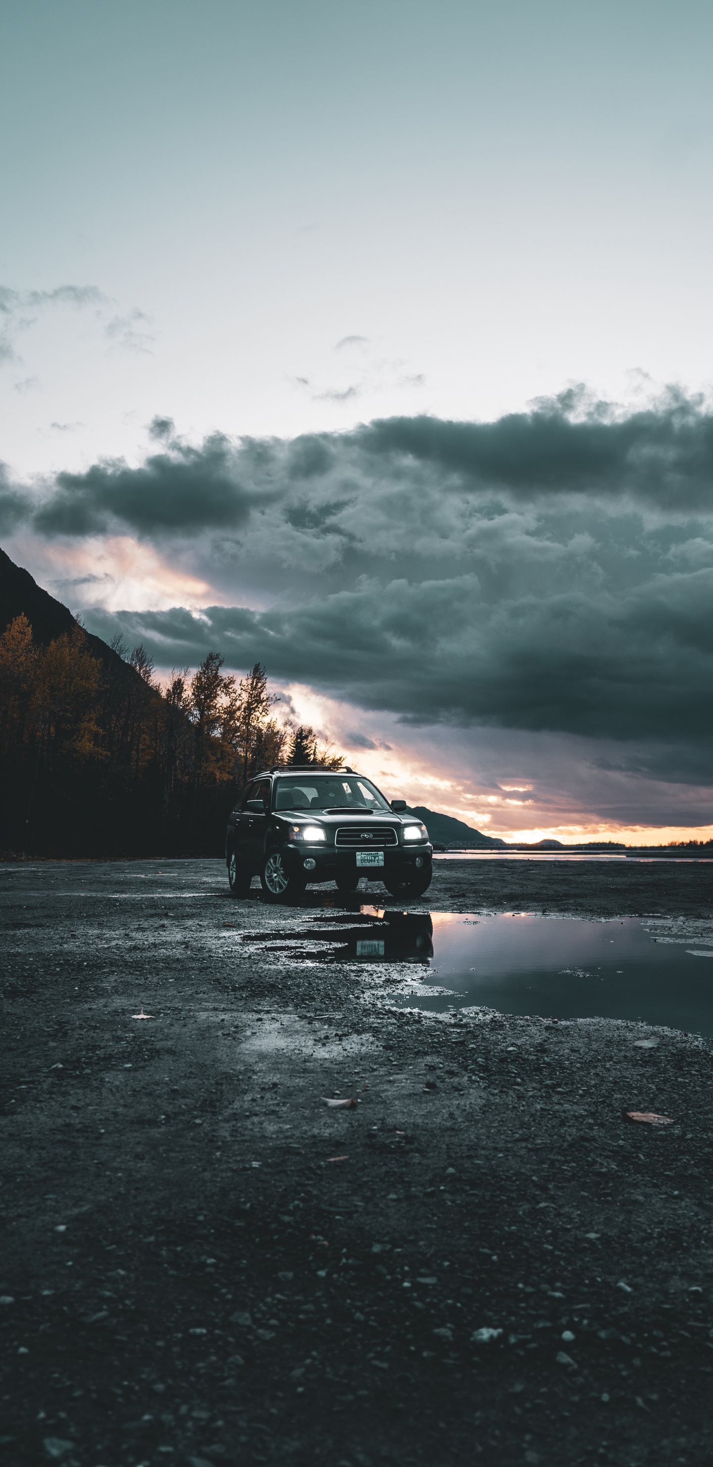Black Suv on Road Near Mountain During Daytime. Wallpaper in 1440x2960 Resolution