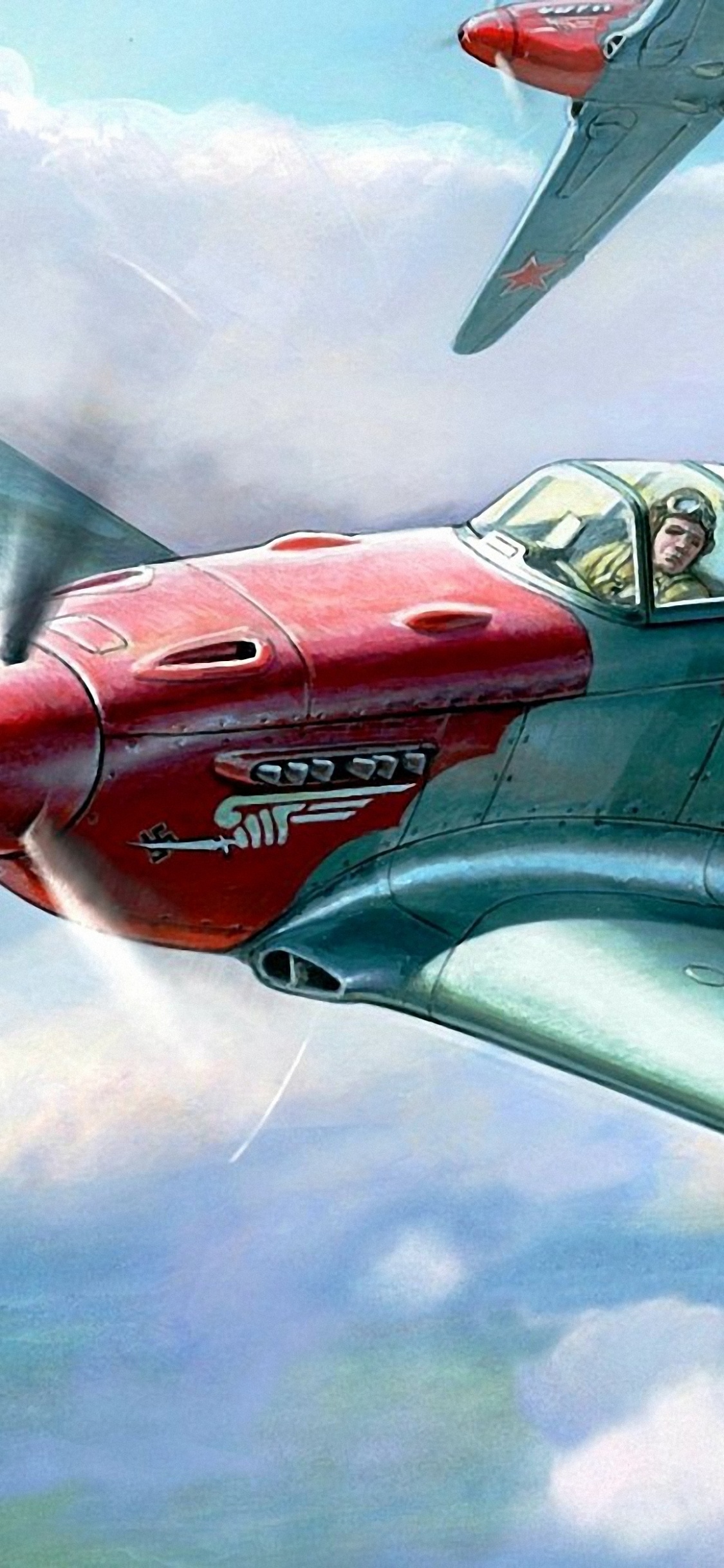 Rotes Und Graues Düsenflugzeug in Der Luft. Wallpaper in 1125x2436 Resolution