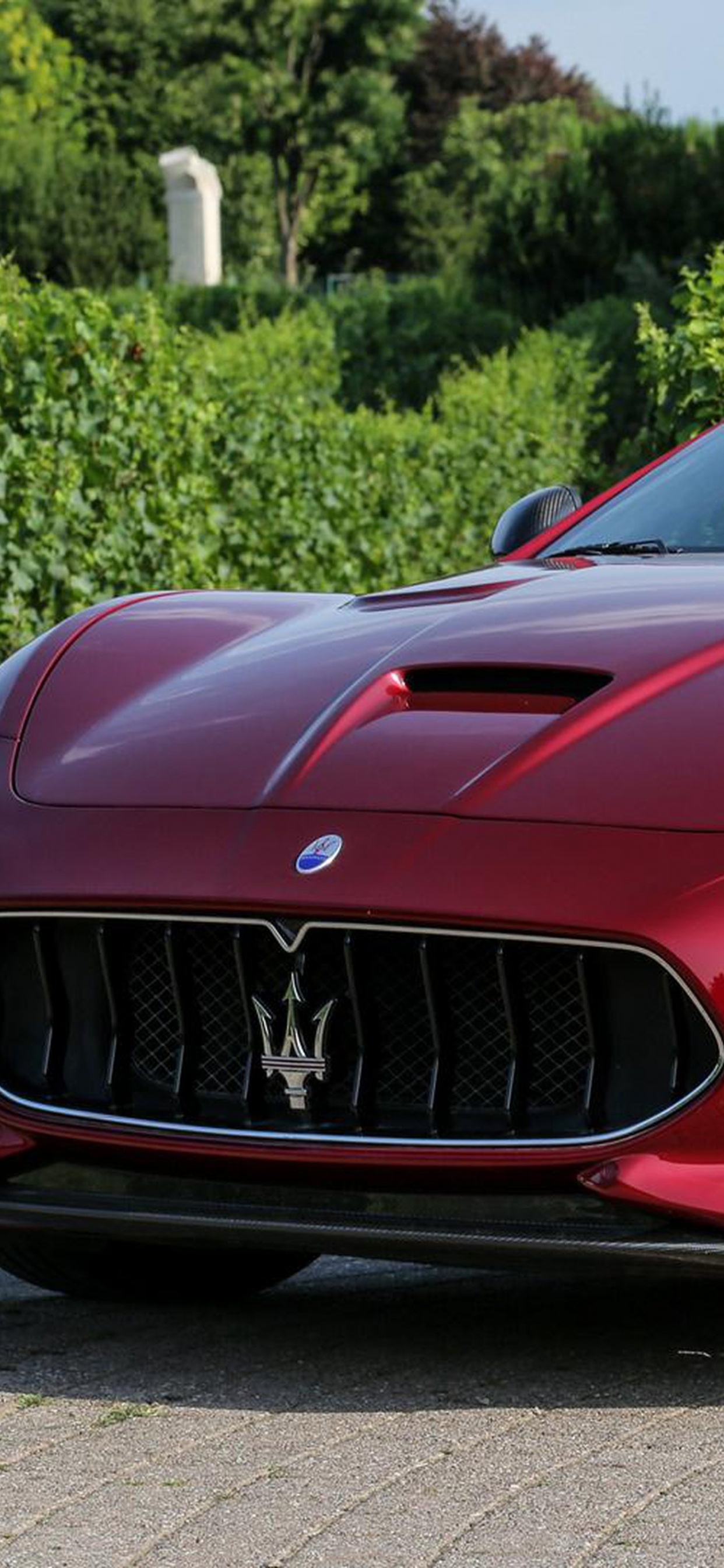 Red Bmw m 3 Coupe Parked on The Side of The Road During Daytime. Wallpaper in 1242x2688 Resolution