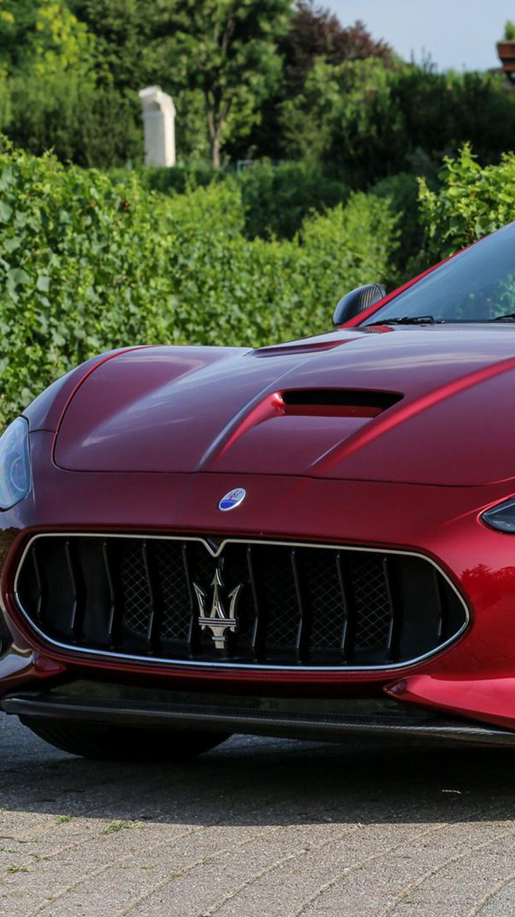 Red Bmw m 3 Coupe Parked on The Side of The Road During Daytime. Wallpaper in 750x1334 Resolution