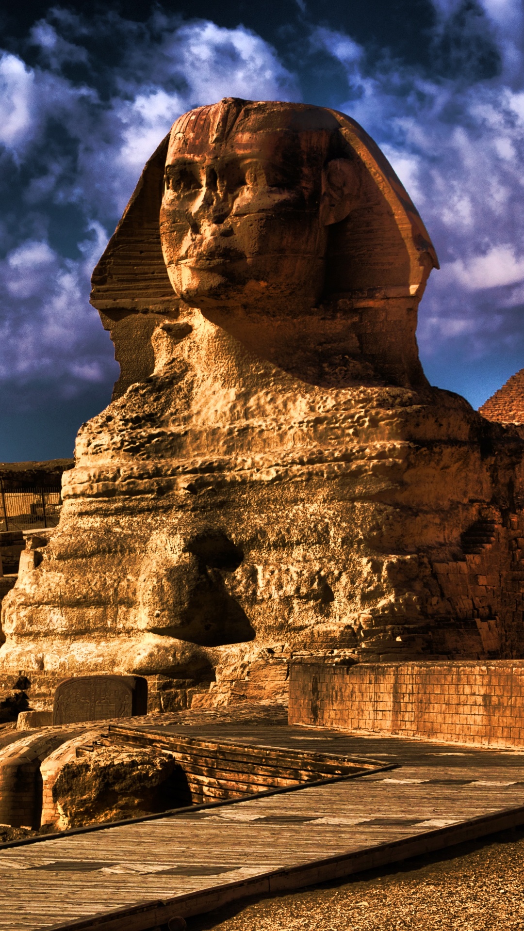 Brown Concrete Statue Under Cloudy Sky During Daytime. Wallpaper in 1080x1920 Resolution