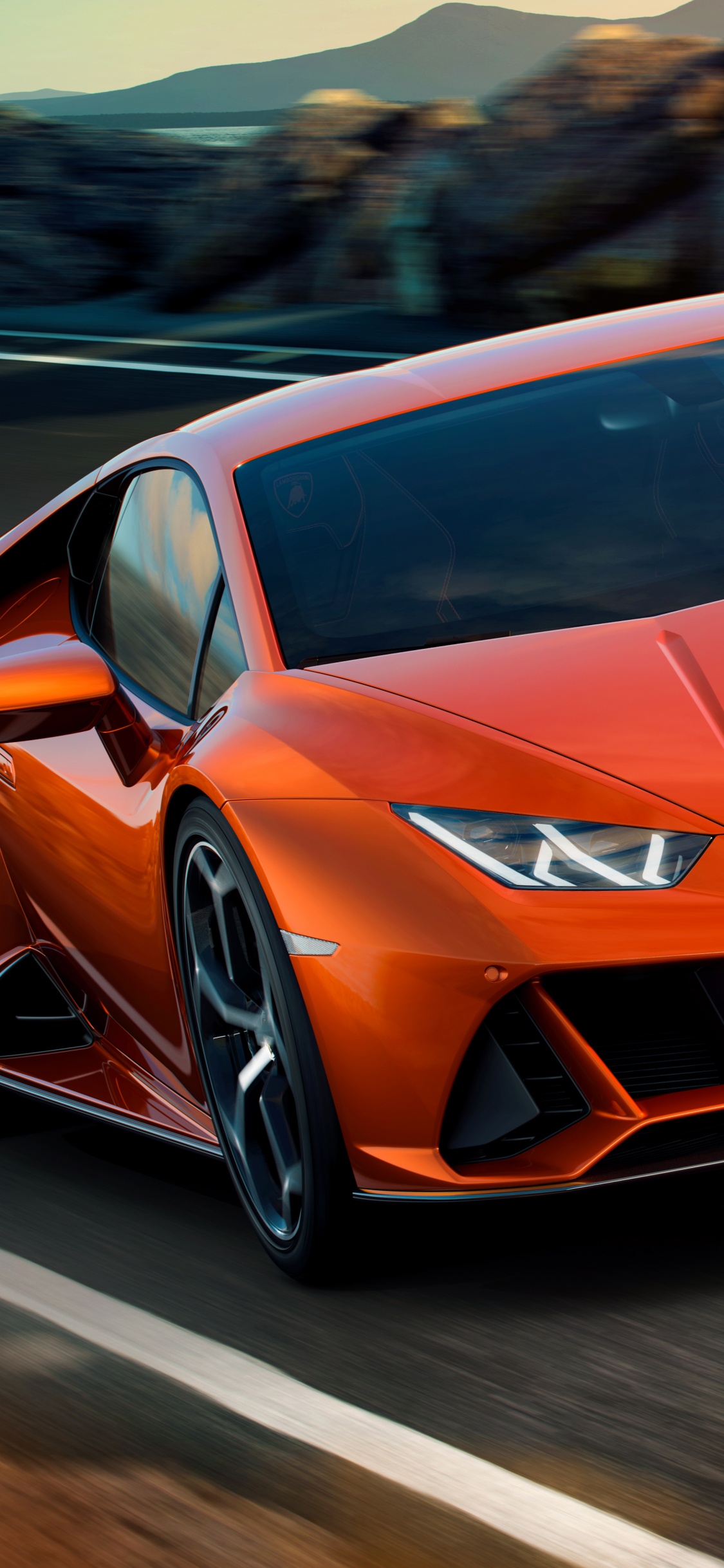 Roter Ferrari 458 Italia Tagsüber Unterwegs. Wallpaper in 1125x2436 Resolution