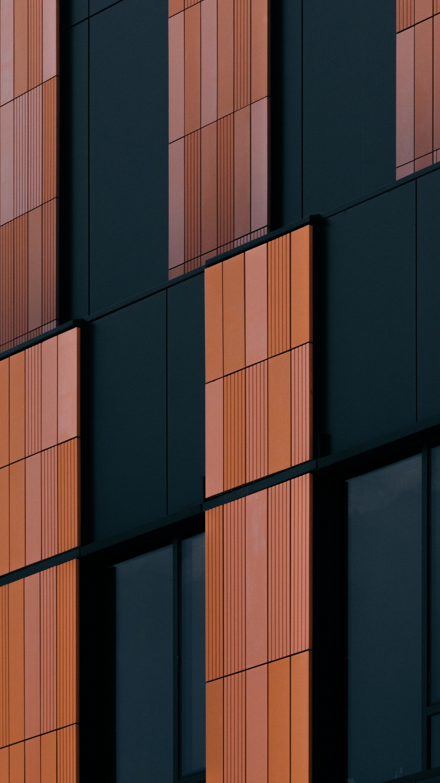 Braunes Und Schwarzes Betongebäude. Wallpaper in 1440x2560 Resolution