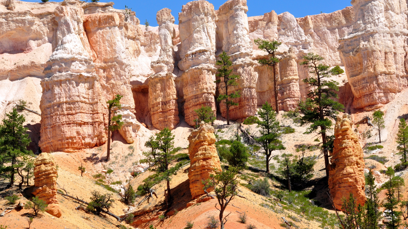 Brown Rocky Mountain Under Blue Sky During Daytime. Wallpaper in 1366x768 Resolution