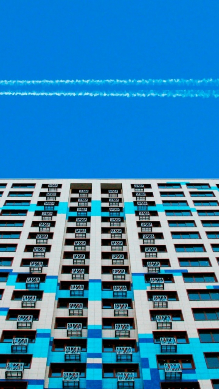 White and Blue Building Under Blue Sky During Daytime. Wallpaper in 720x1280 Resolution