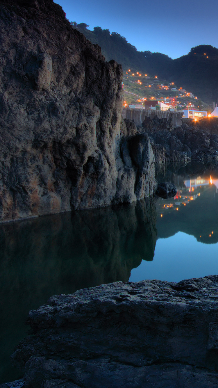 Body of Water Near Mountain During Daytime. Wallpaper in 750x1334 Resolution