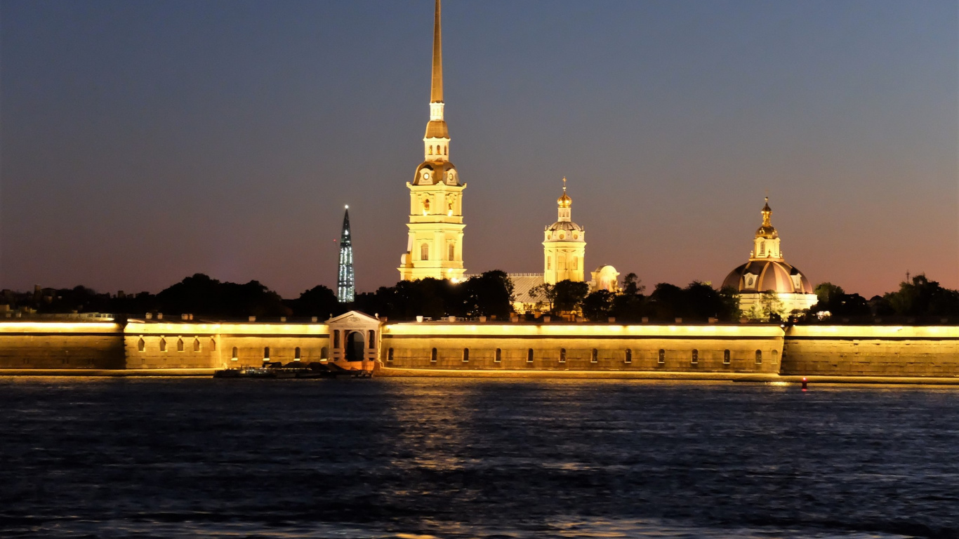 White Concrete Building During Night Time. Wallpaper in 1366x768 Resolution