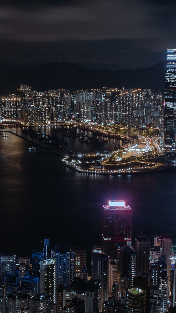 City Skyline During Night Time. Wallpaper in 720x1280 Resolution