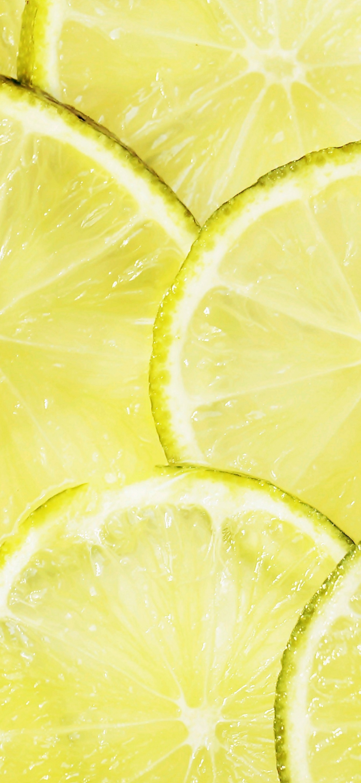 Gelbe Zitronenfrucht Mit Wassertropfen. Wallpaper in 1242x2688 Resolution