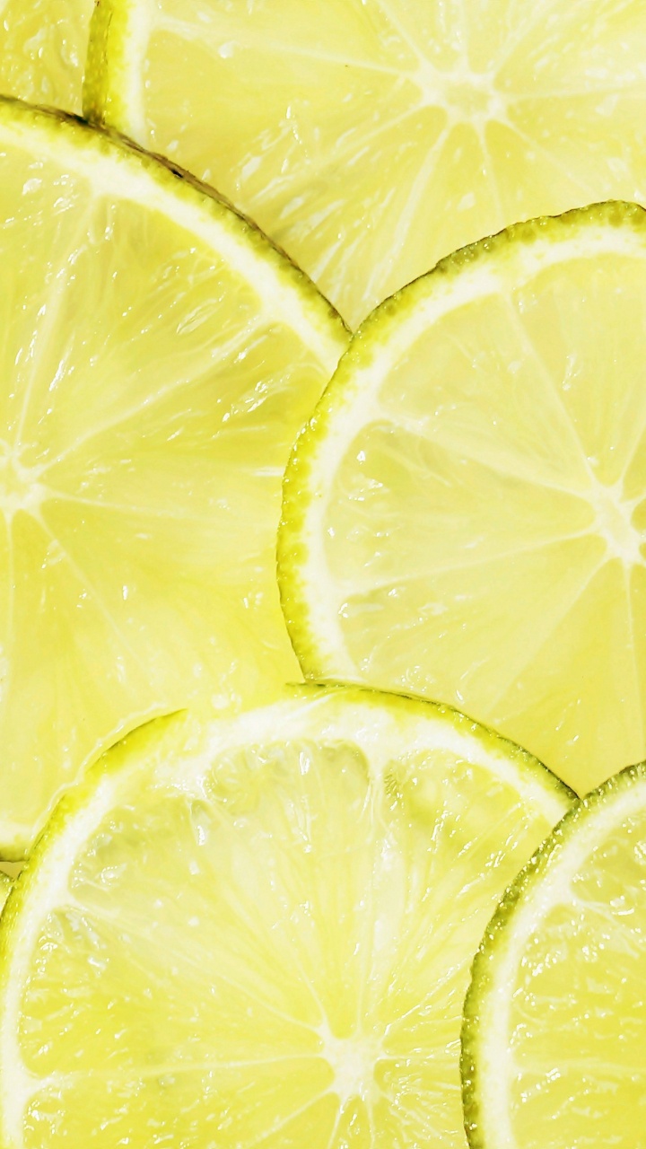 Gelbe Zitronenfrucht Mit Wassertropfen. Wallpaper in 720x1280 Resolution