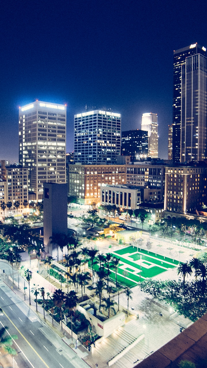 Aerial View of City Buildings During Night Time. Wallpaper in 720x1280 Resolution