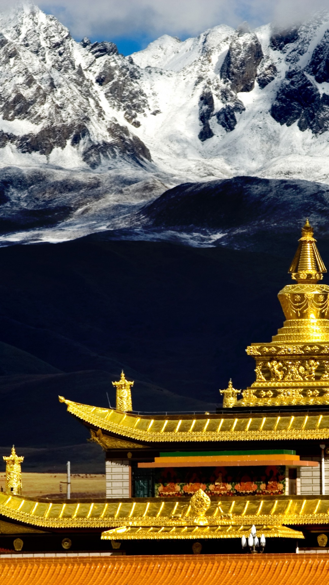 Gold Temple Near Snow Covered Mountain. Wallpaper in 1080x1920 Resolution
