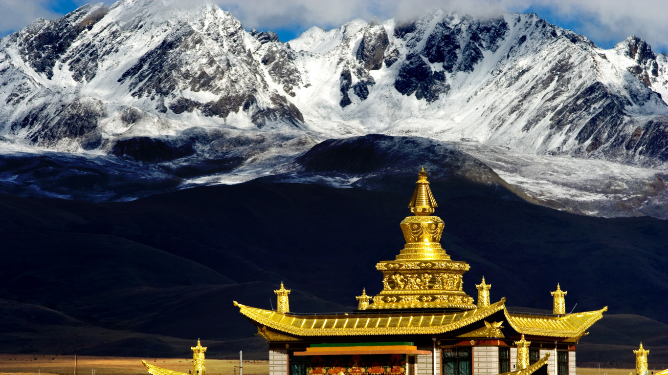 Gold Temple Near Snow Covered Mountain. Wallpaper in 1366x768 Resolution