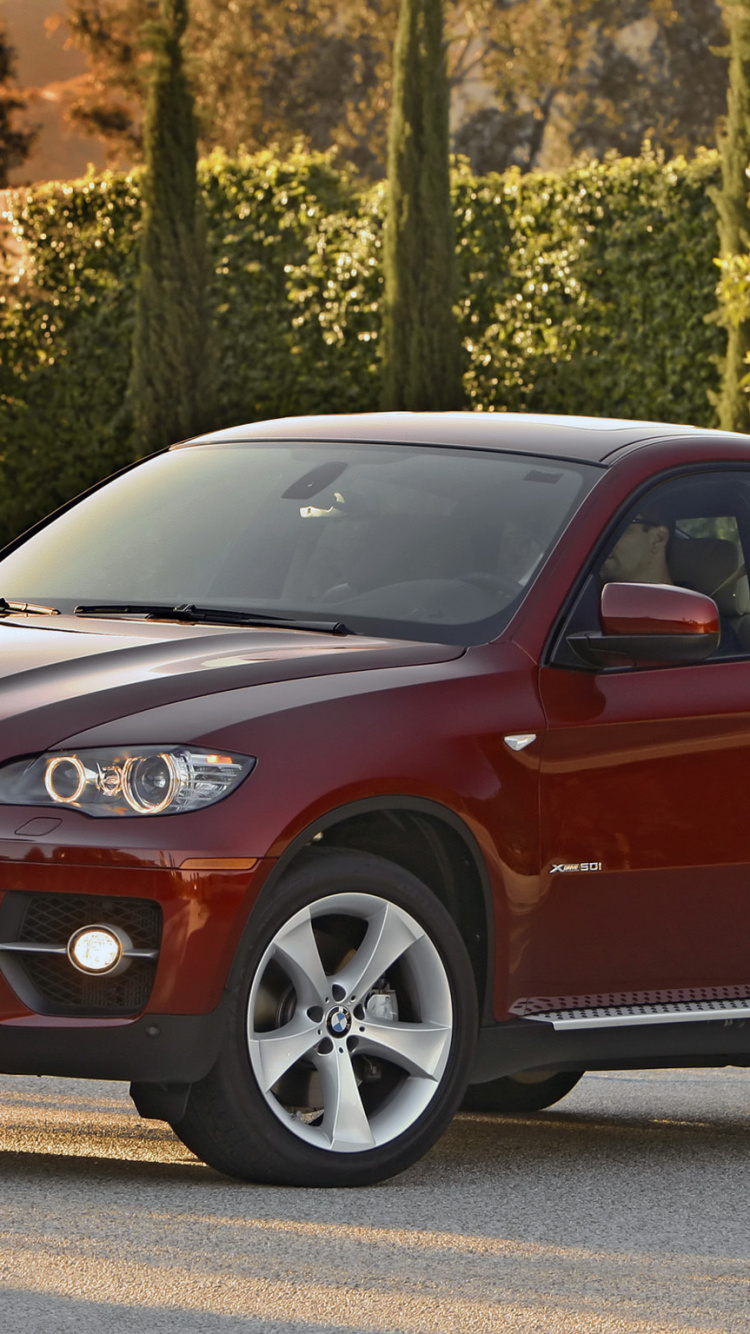 Red Audi a 4 on Road During Daytime. Wallpaper in 750x1334 Resolution