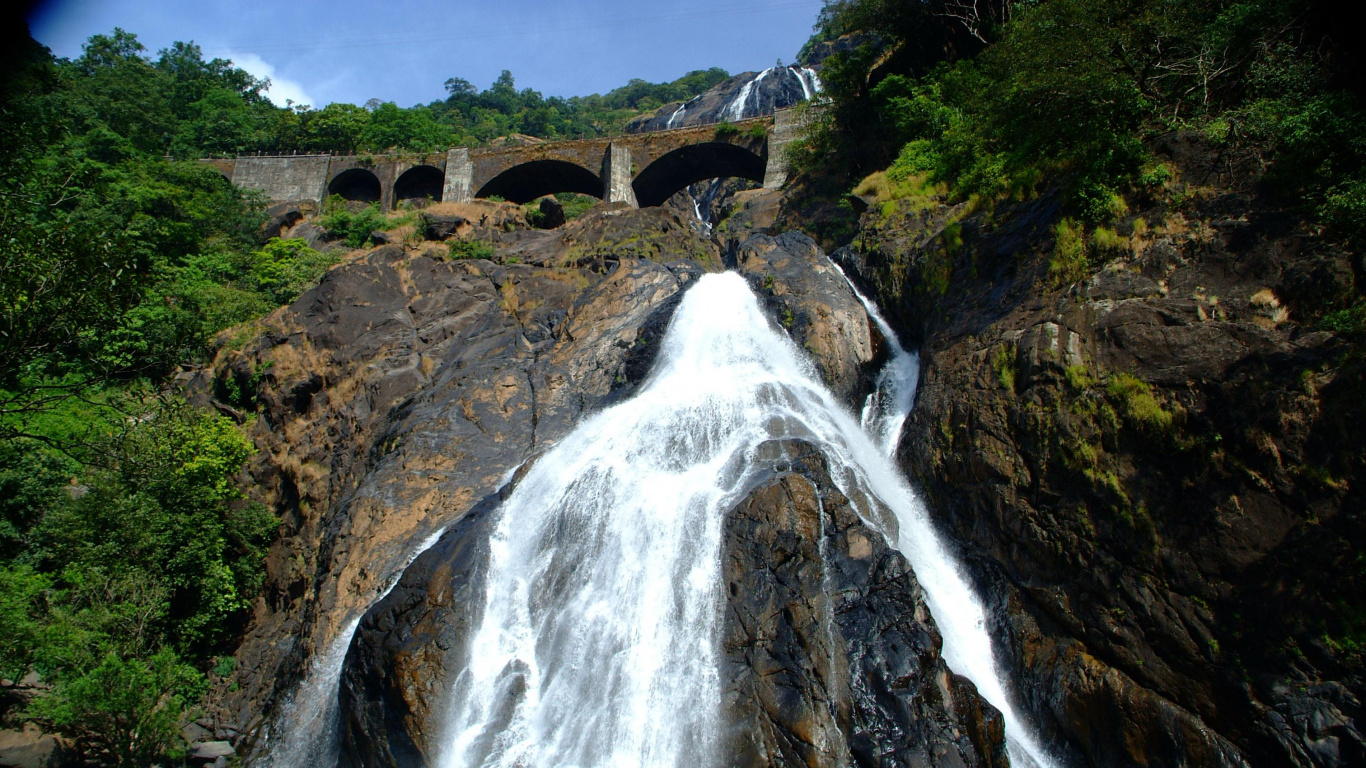 Waterfalls Near Green Trees During Daytime. Wallpaper in 1366x768 Resolution