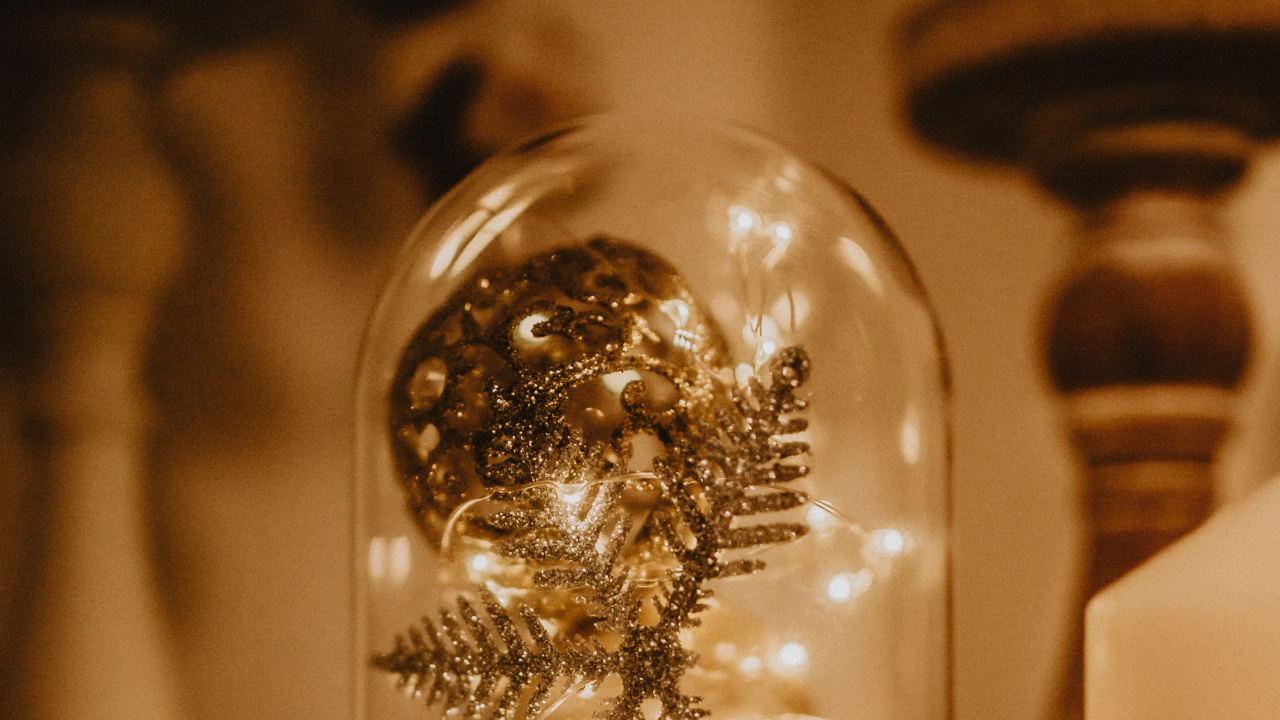 Clear Glass Ball on Brown Wooden Table. Wallpaper in 1280x720 Resolution