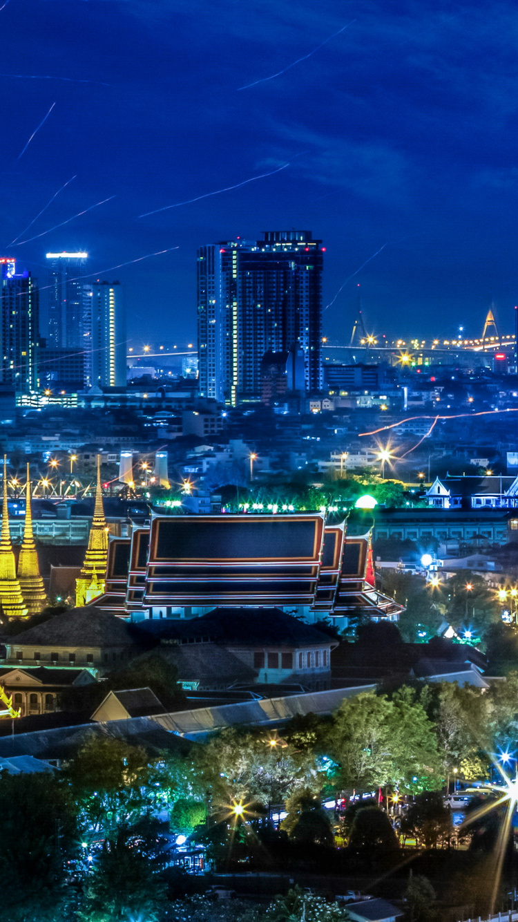 City With High Rise Buildings During Night Time. Wallpaper in 750x1334 Resolution