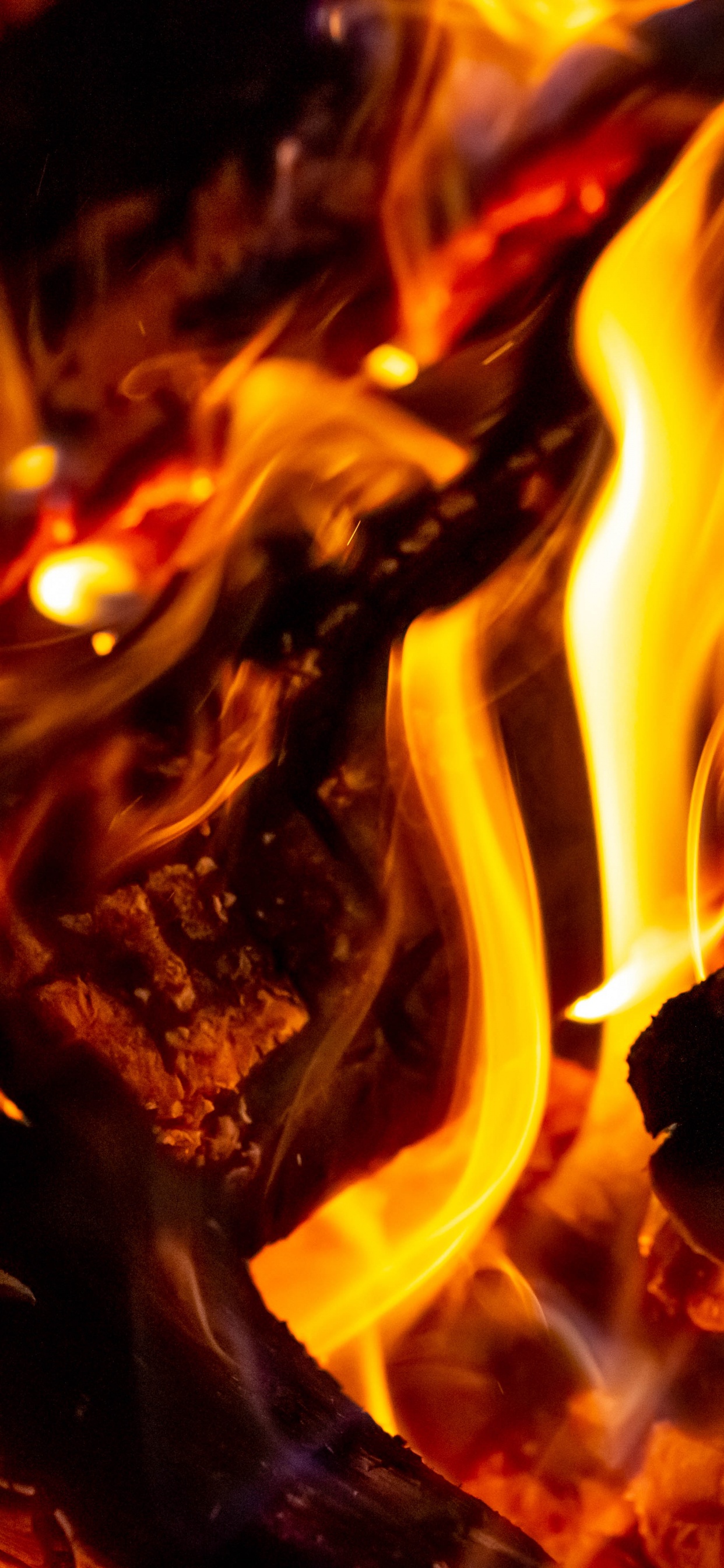 Orange and Black Fire in Close up Photography. Wallpaper in 1242x2688 Resolution