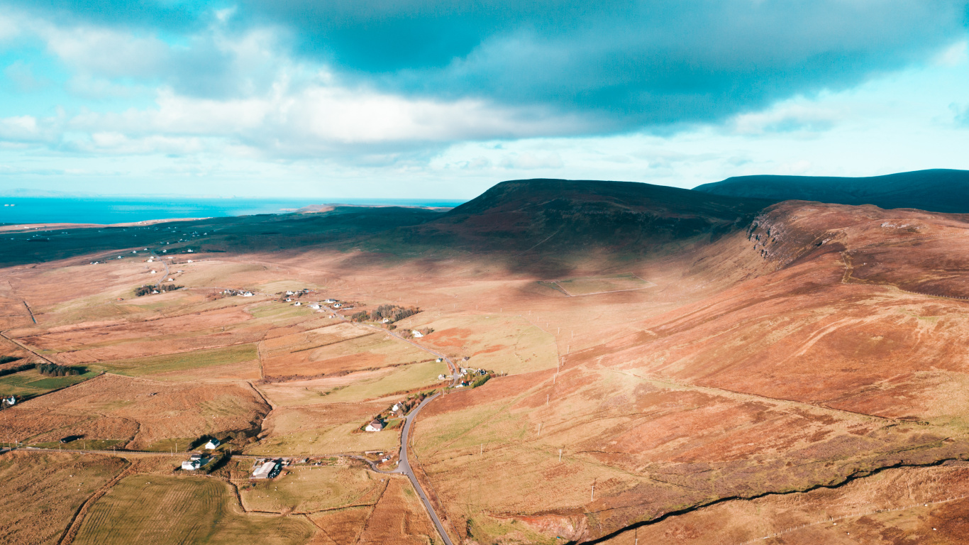 Brown Mountain Under Blue Sky During Daytime. Wallpaper in 1366x768 Resolution