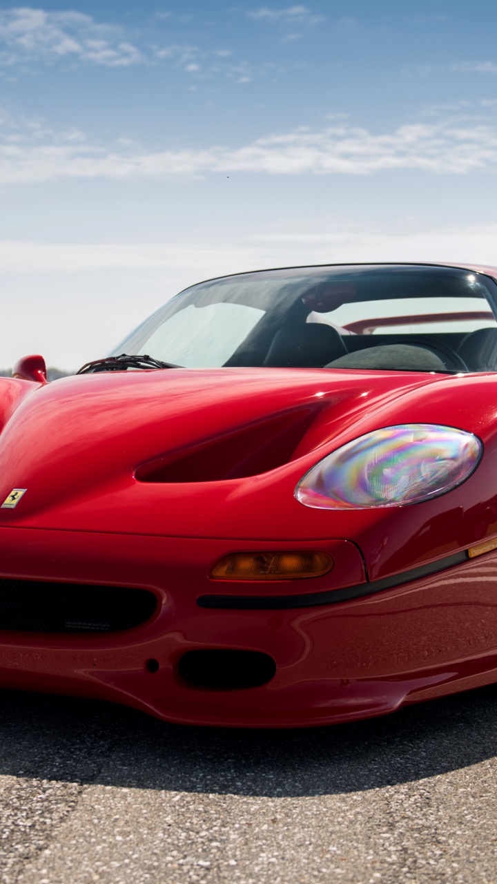 Red Ferrari 458 Italia on Road During Daytime. Wallpaper in 720x1280 Resolution