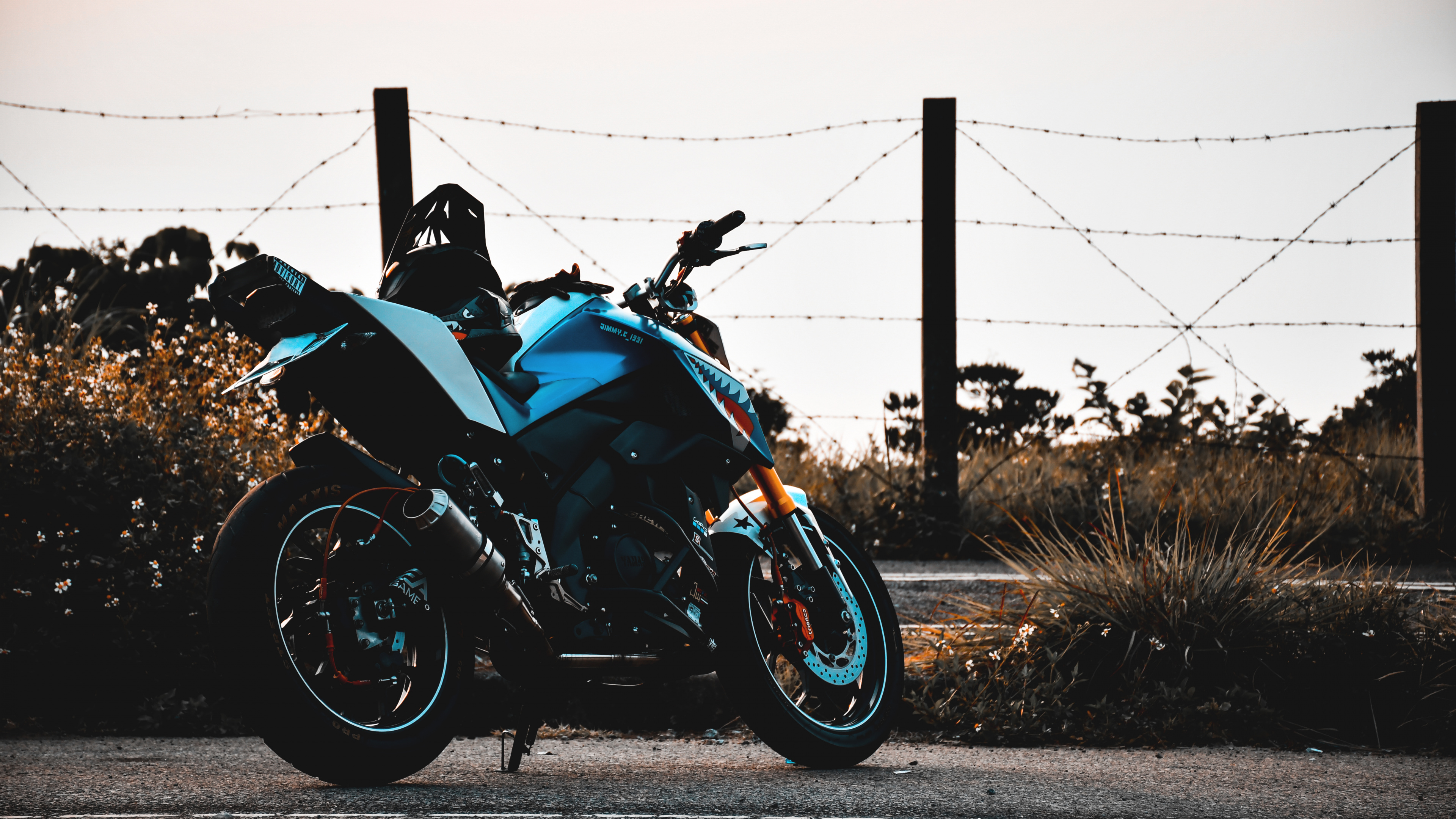 Black and Blue Sports Bike Parked on Gray Concrete Road During Daytime. Wallpaper in 3840x2160 Resolution